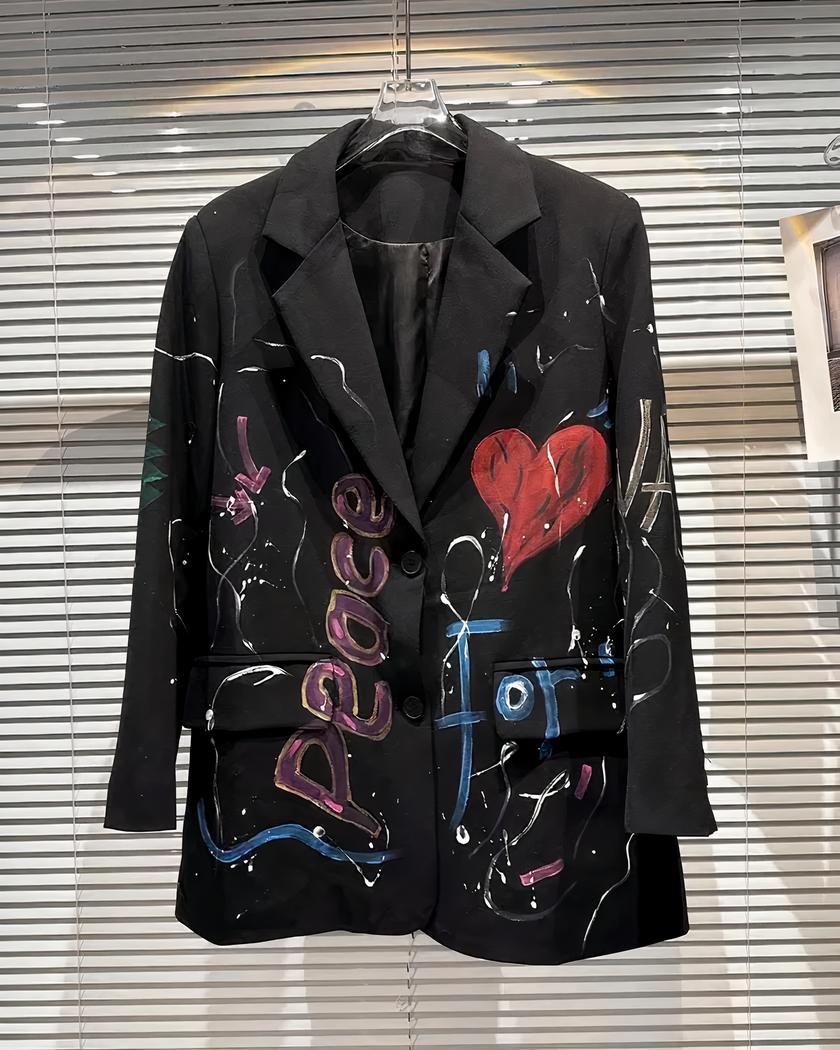 Blazer impimé grafitti pour femme Blazer noir avec des motifs style graffiti suspendu à un cintre